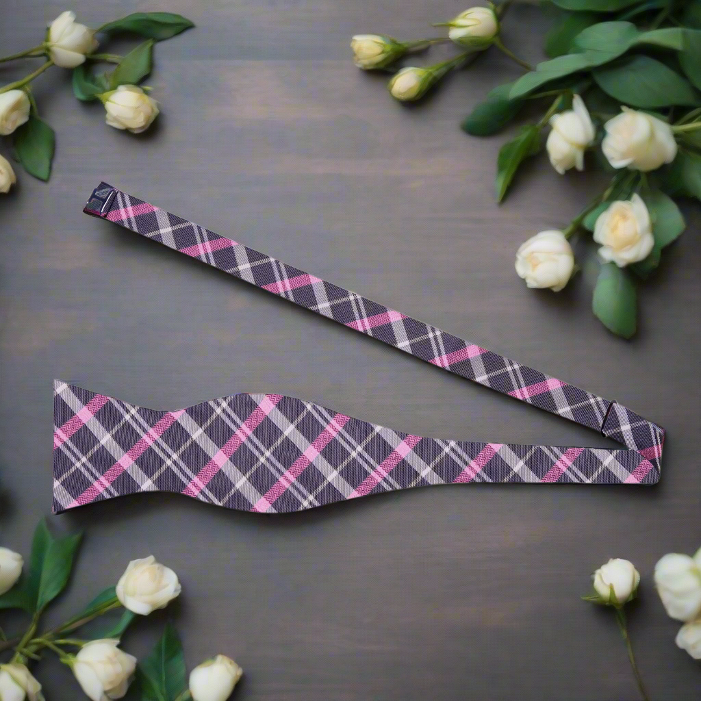 Front view of mens plaid silk bow tie highlighting pattern and color scheme