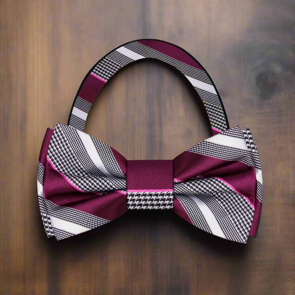 Man adjusting a yellow bow tie for a formal event