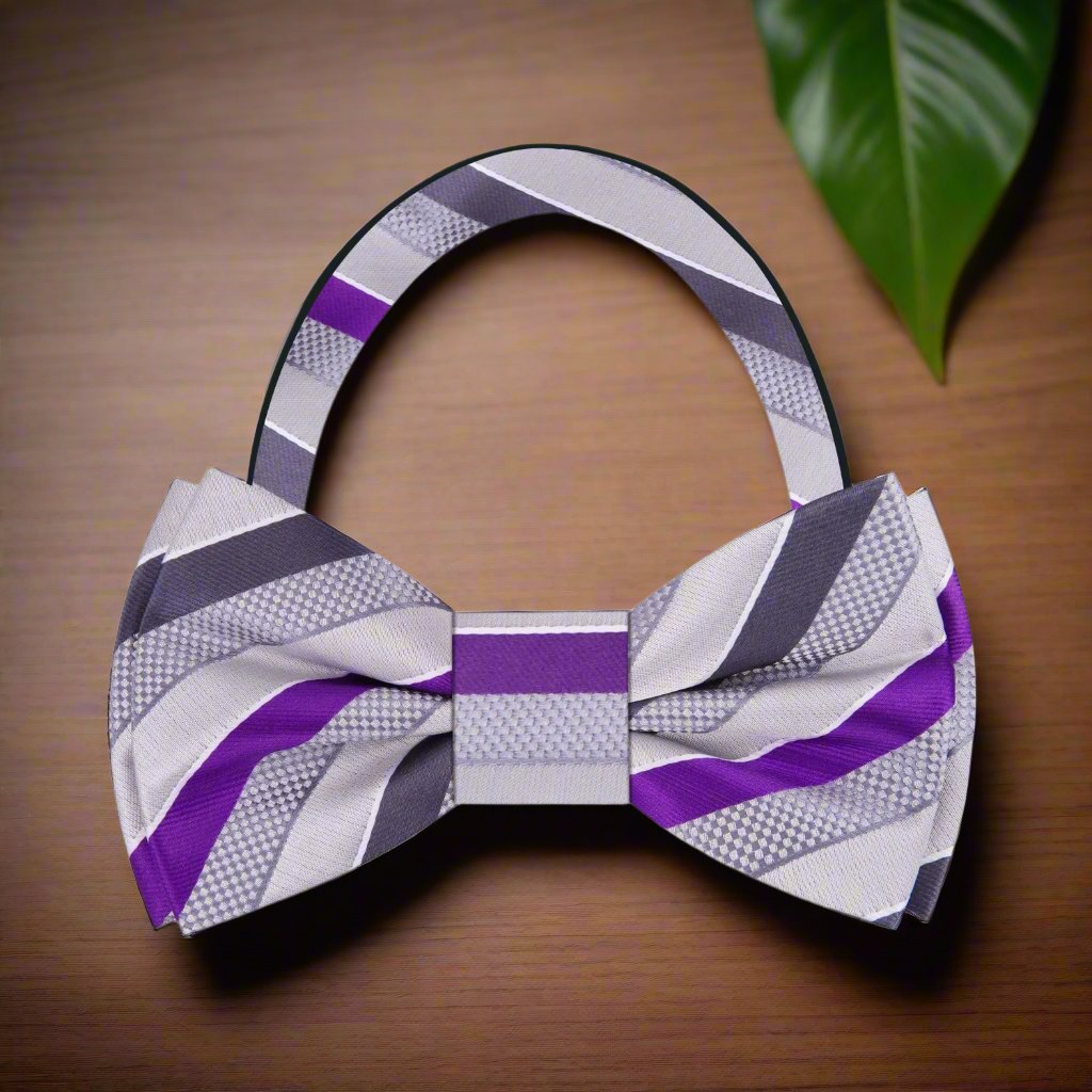 Close-up view of the silk texture of the grey and purple stripe bow tie