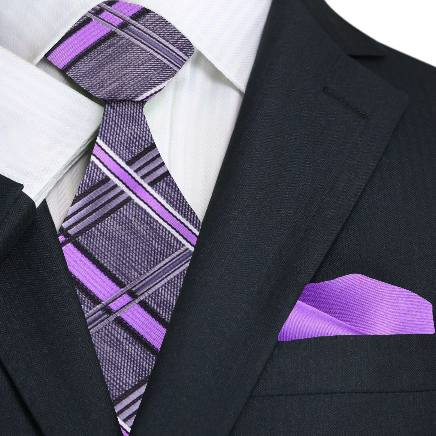 Close-up of the plaid pattern on the grey and lavender silk necktie.