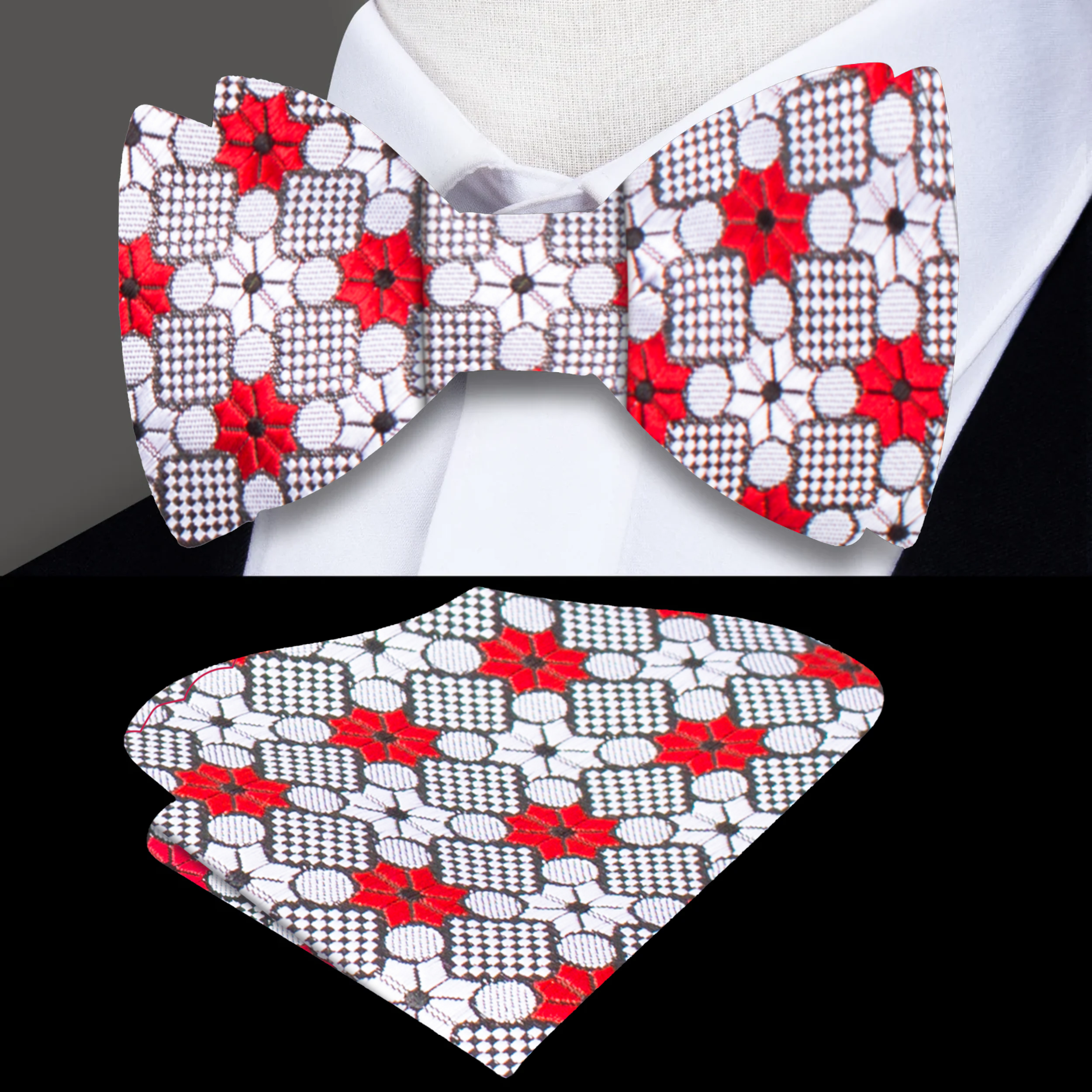 Close-up of the Crimson Burst Silk Bow Tie showcasing the intricate grey and red flower burst design.