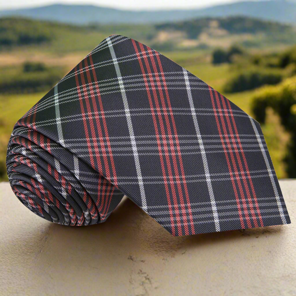 Front view of a silk plaid necktie with a sophisticated pattern
