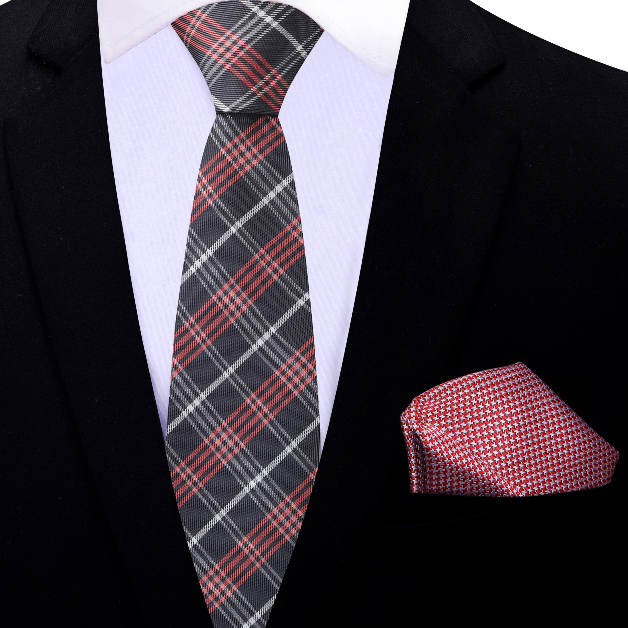 Close-up of a plaid necktie knot, highlighting the luxurious silk fabric
