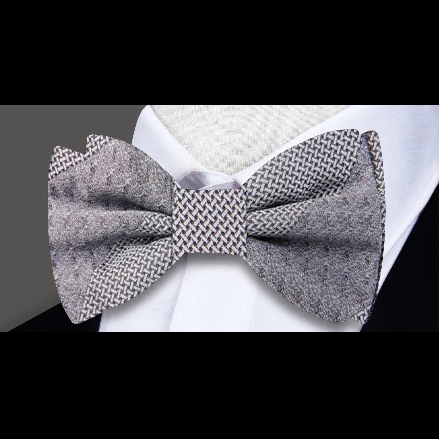 Close-up of a textured red silk bow tie for formal events