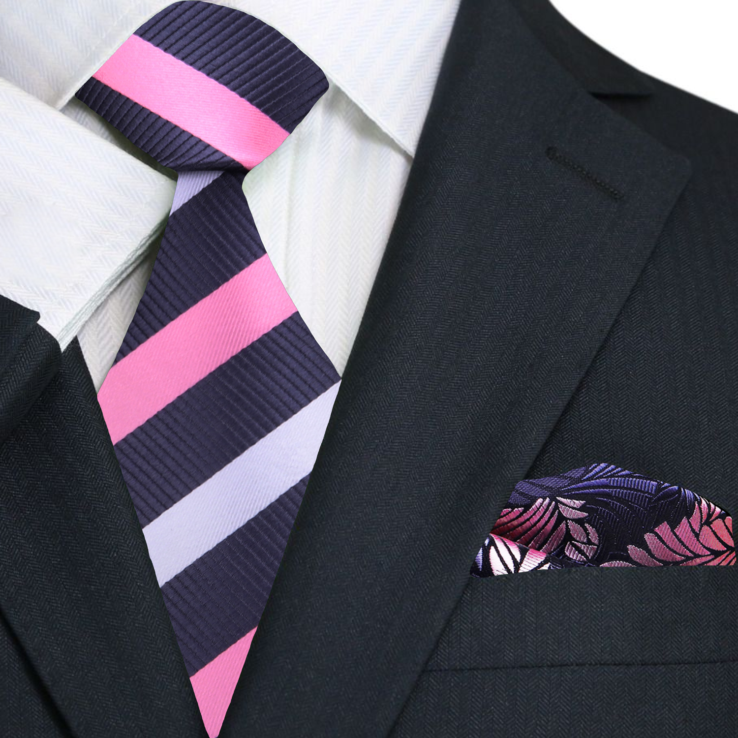 Man wearing the grey pink silk tie with a white dress shirt and navy suit for a wedding