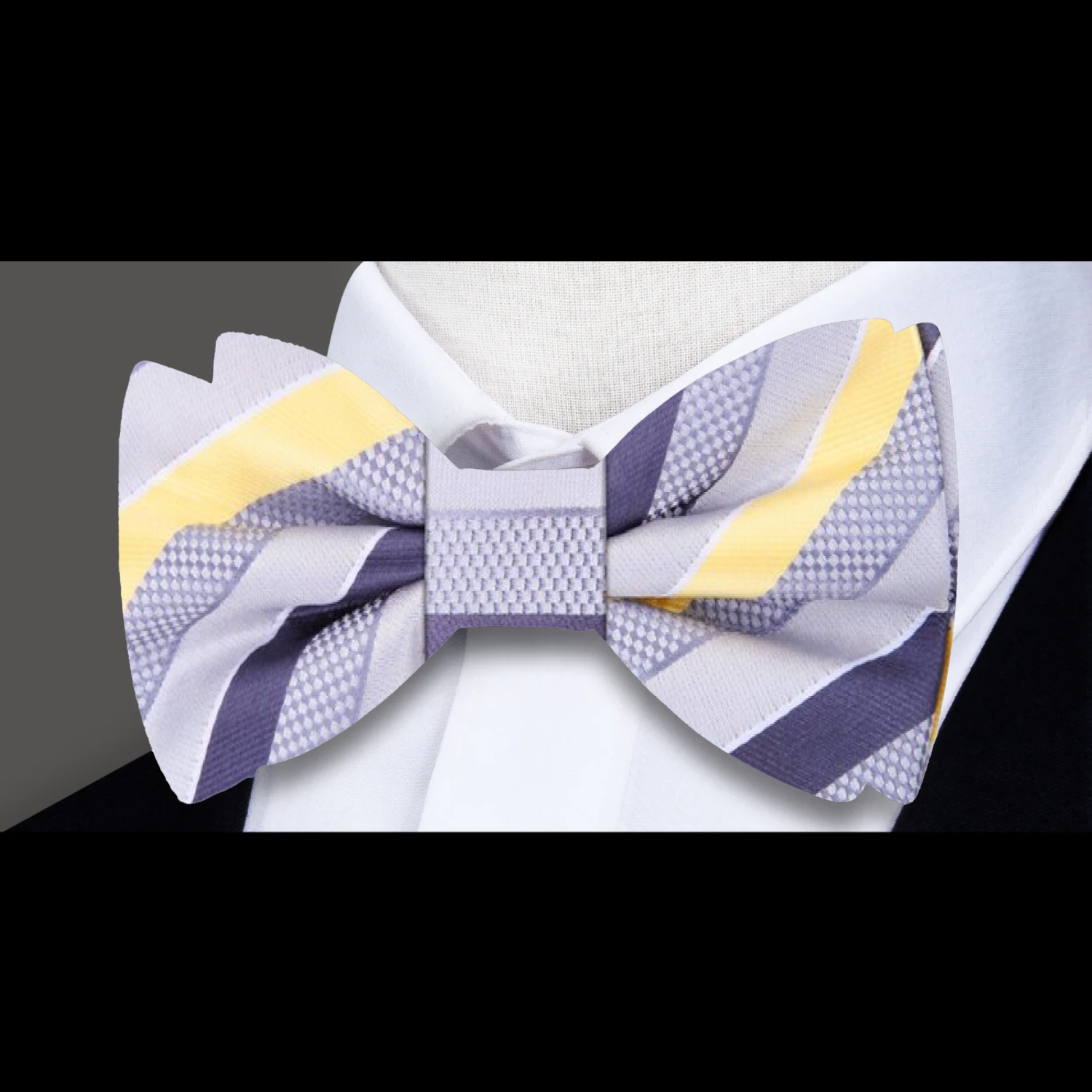 Pre-tied mens bow tie shown with a matching pocket square