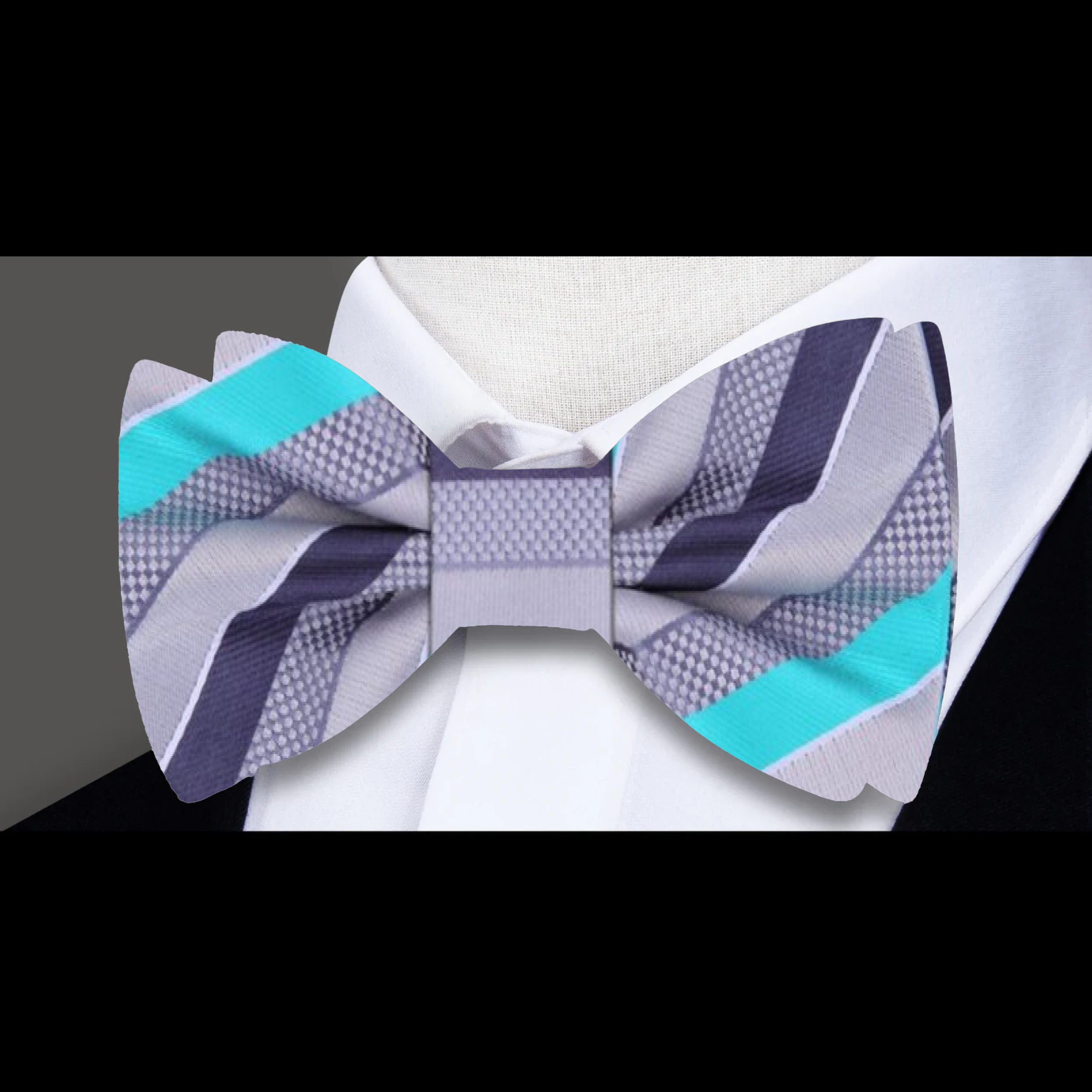 Pre-tied mens bow tie shown with a matching pocket square