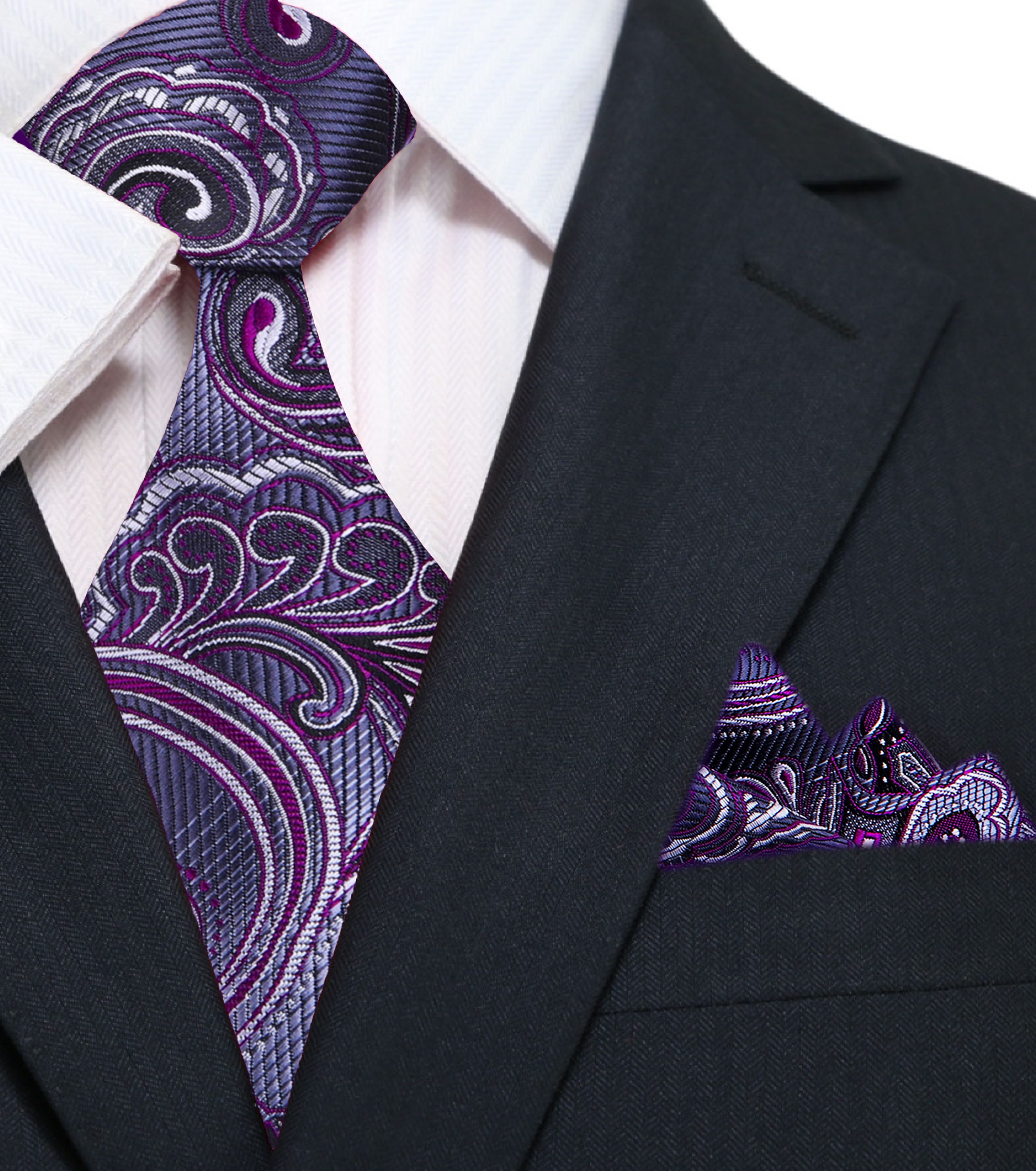 Burgundy paisley silk necktie displayed on a tailored suit, showing intricate patterns.