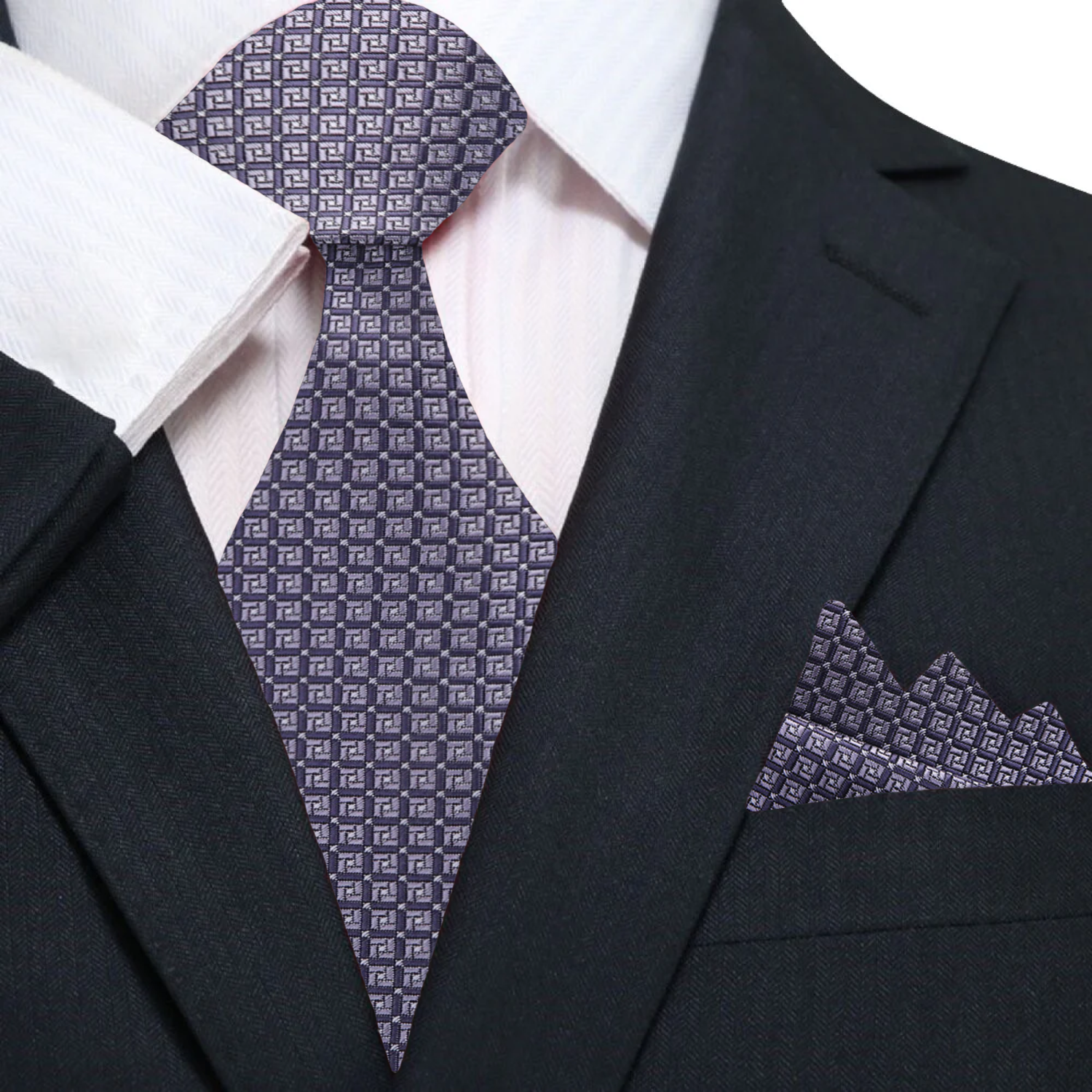 Close-up of the geometric pattern on the Chatterwick necktie showcasing its silk texture.