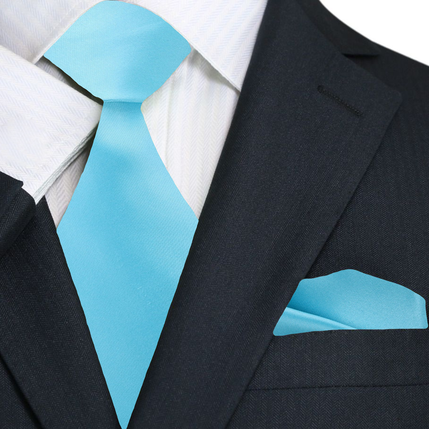 Close-up of a luxurious silk tie in deep navy, highlighting its fine craftsmanship and sheen.