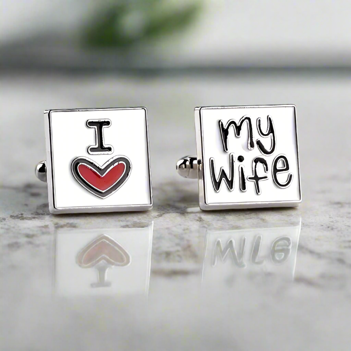 Close-up of personalized 'I Love My Wife' cufflinks on a shirt cuff, showcasing detail and craftsmanship