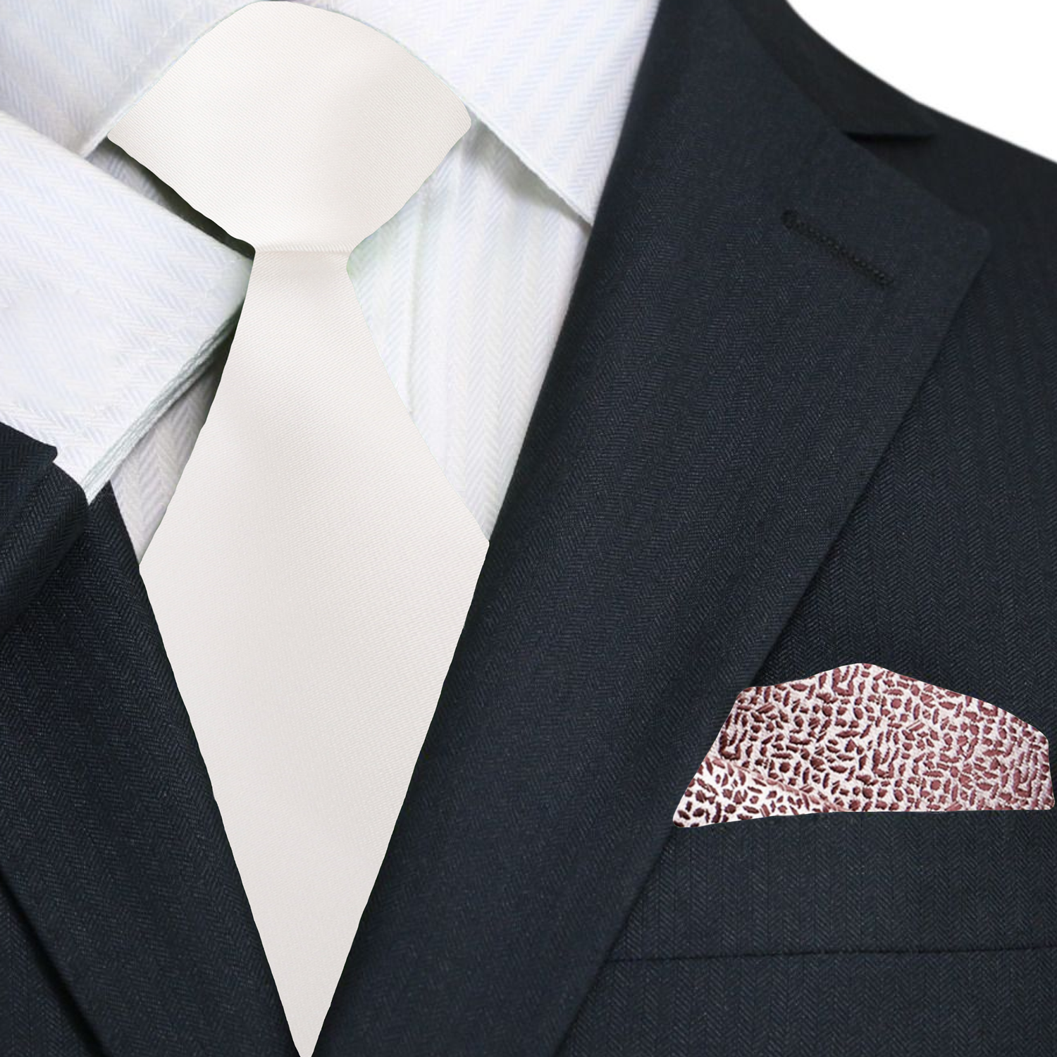 Close-up of the ivory tie and pocket square set, highlighting the silk material and solid color.
