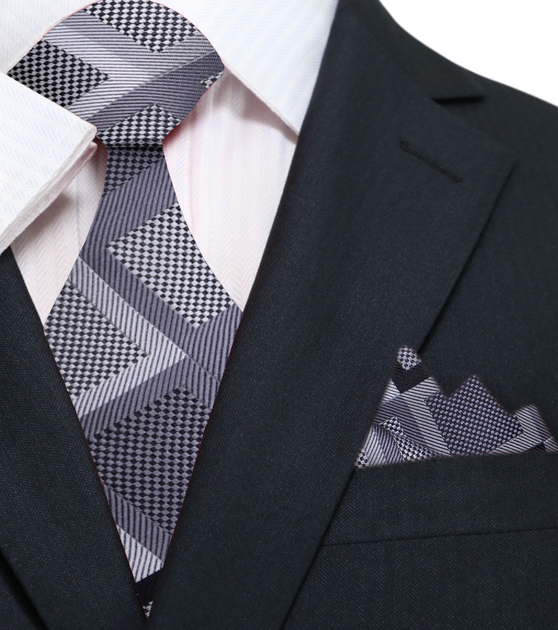 Elegant mens geometric silk necktie with dark grey and black pattern on a models neck