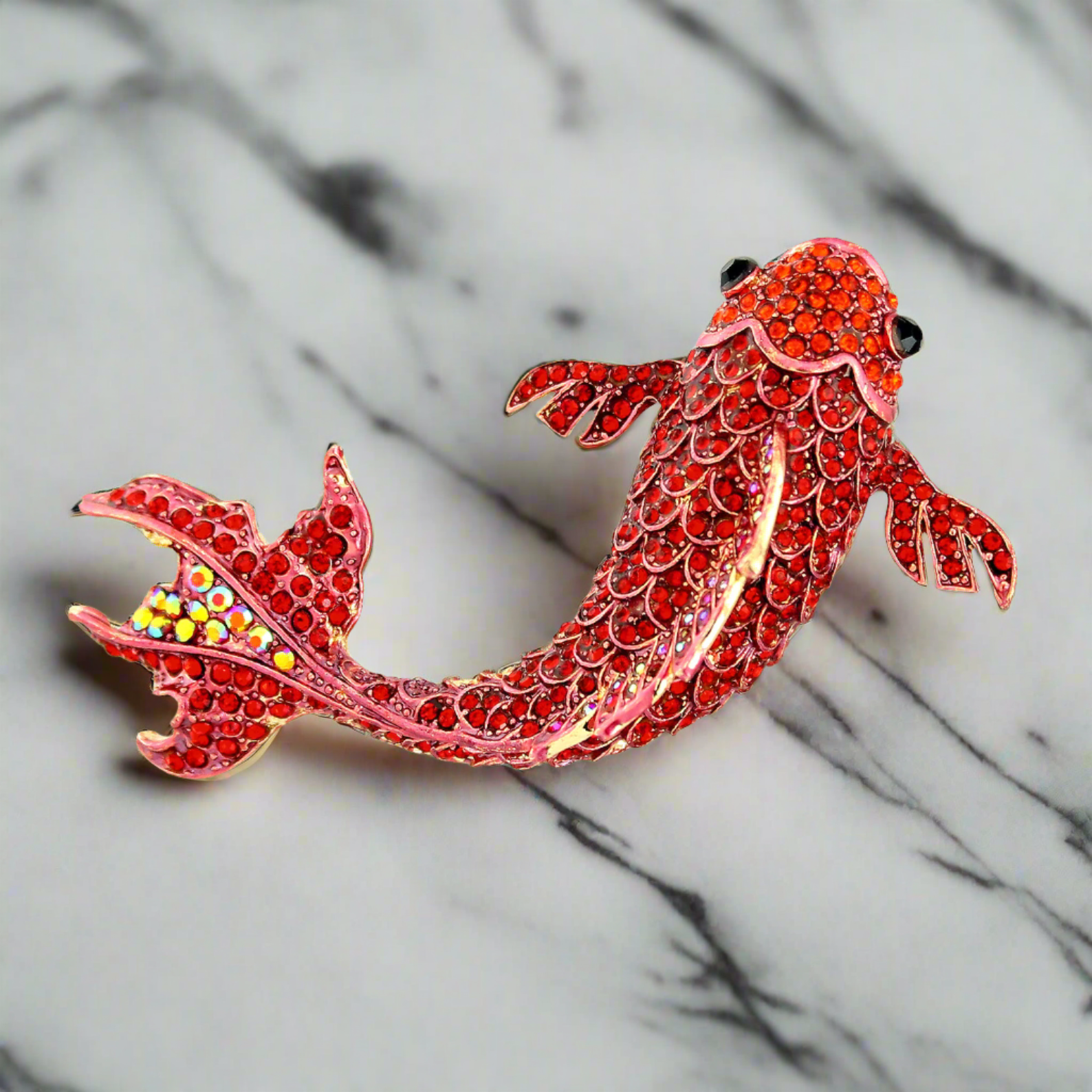 Close-up of the Koi Fish Lapel Pin with shimmering rhinestones on a dark blazer.