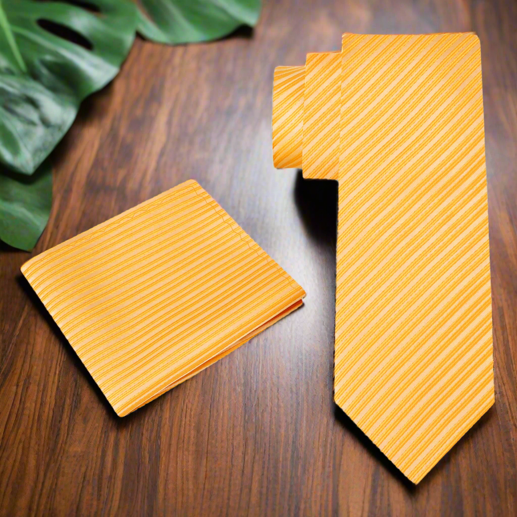Red pinstripe tie showcased with a light grey suit for a summer event.