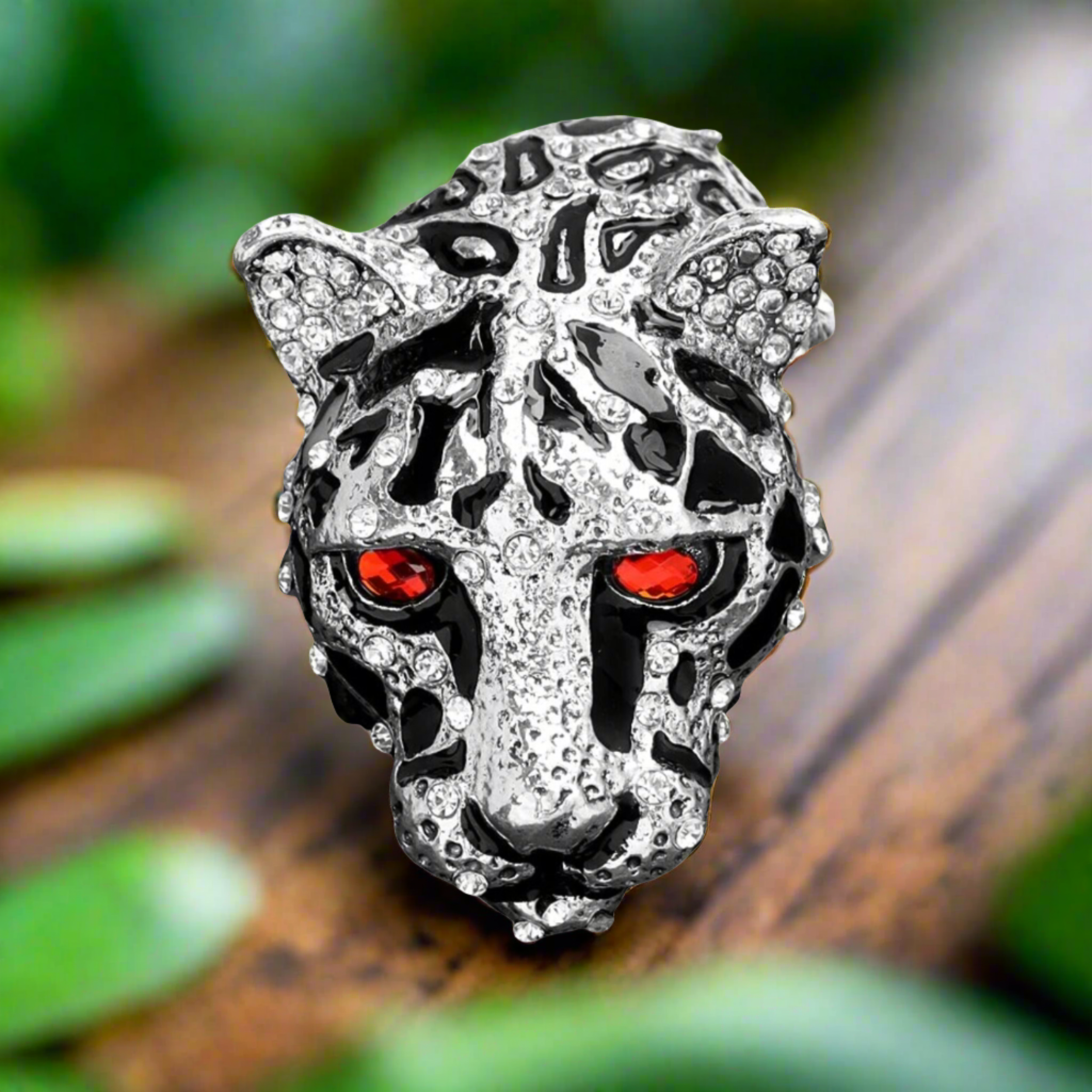 Leopard Head Lapel Pin worn at a formal event, showcasing its striking design.