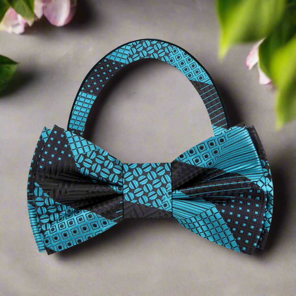 Close-up of a blue geometric silk bow tie on a model for wedding attire