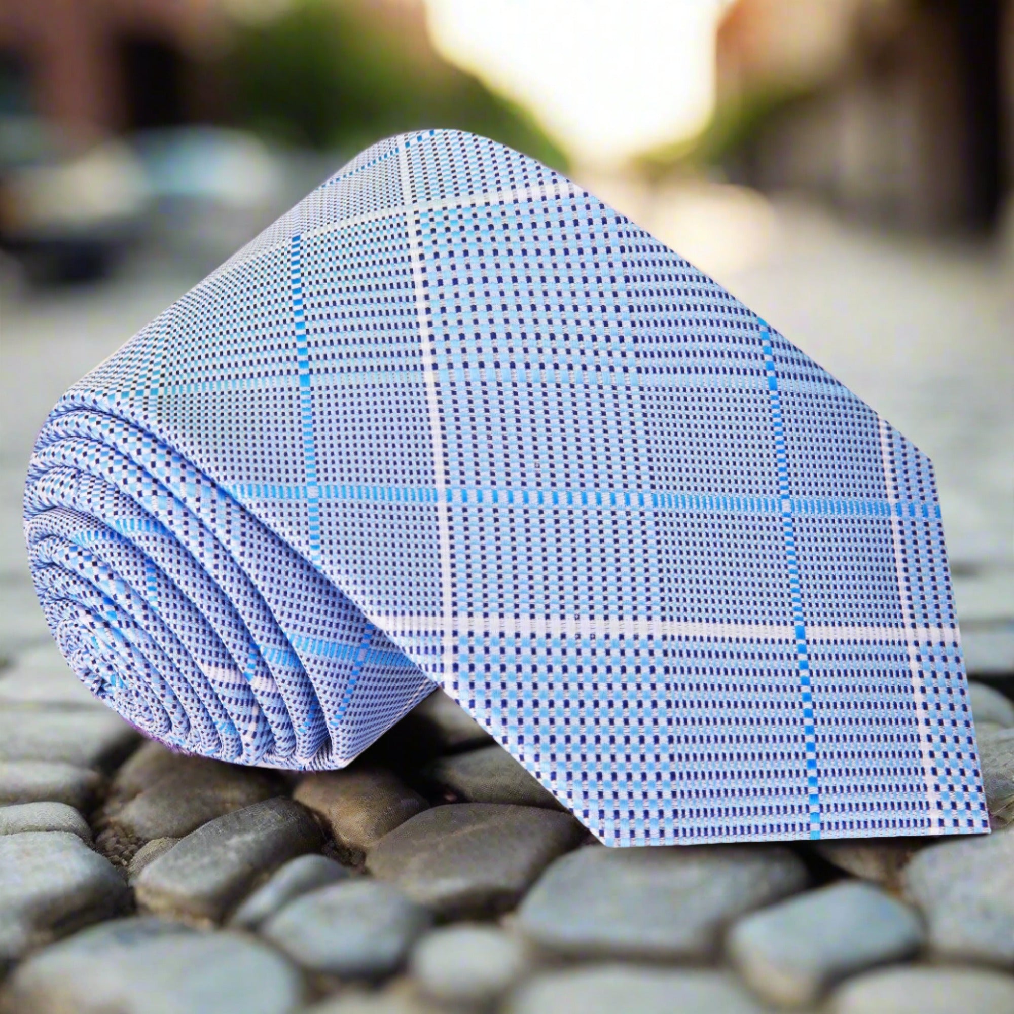 Close-up of blue plaid necktie with silk texture for formal wear