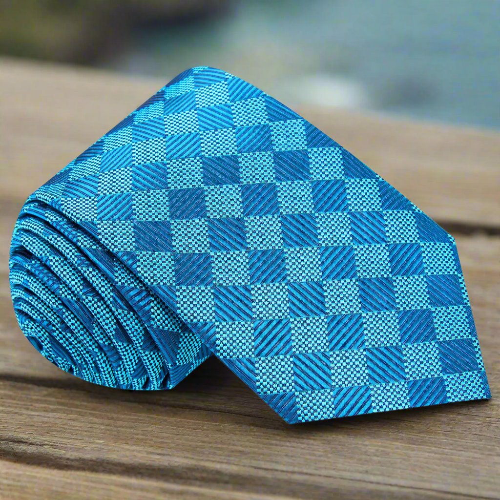Close-up of blue diamond patterned necktie showcasing geometric design