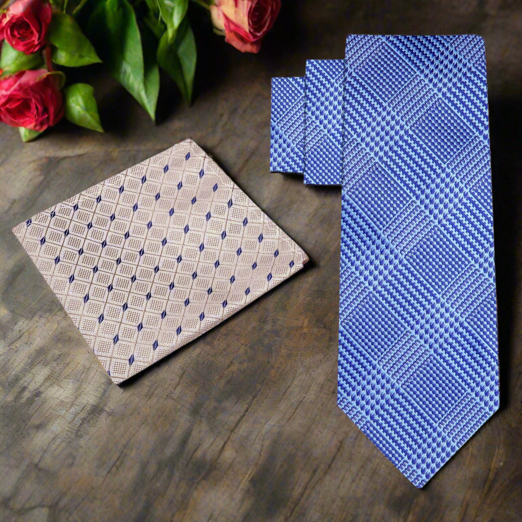 Close-up of the fabric pattern on a light blue plaid silk necktie