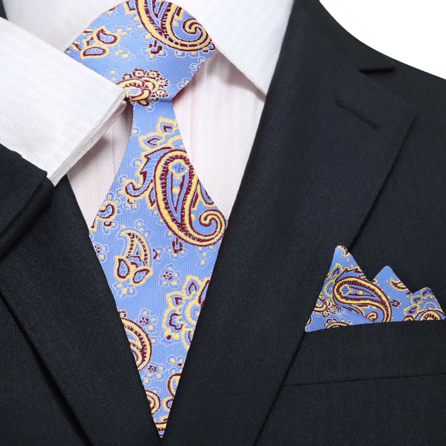 Man wearing a paisley silk tie with a navy suit at a wedding