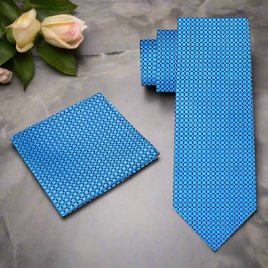 Close-up view of Capri Blue silk tie showcasing its check texture and vibrant color