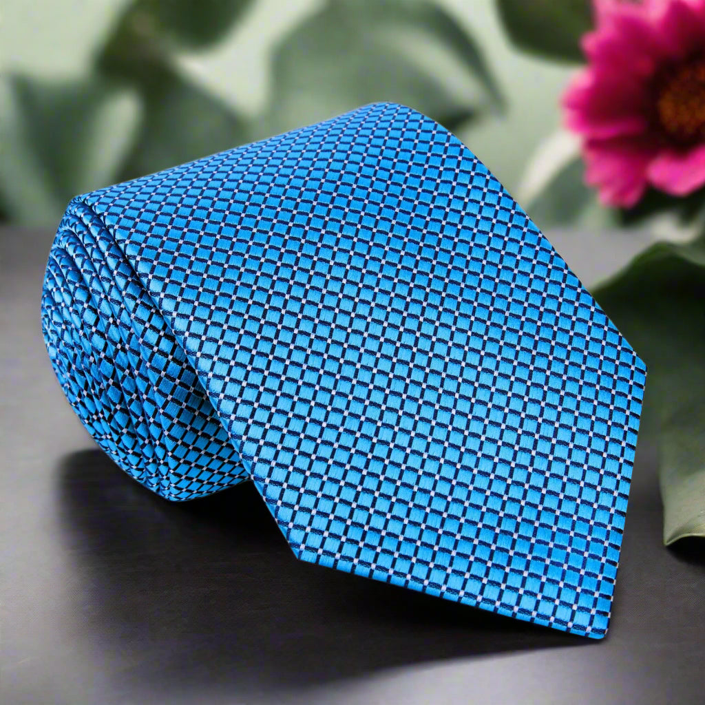 Close-up view of Capri Blue silk tie showcasing its check texture and vibrant color