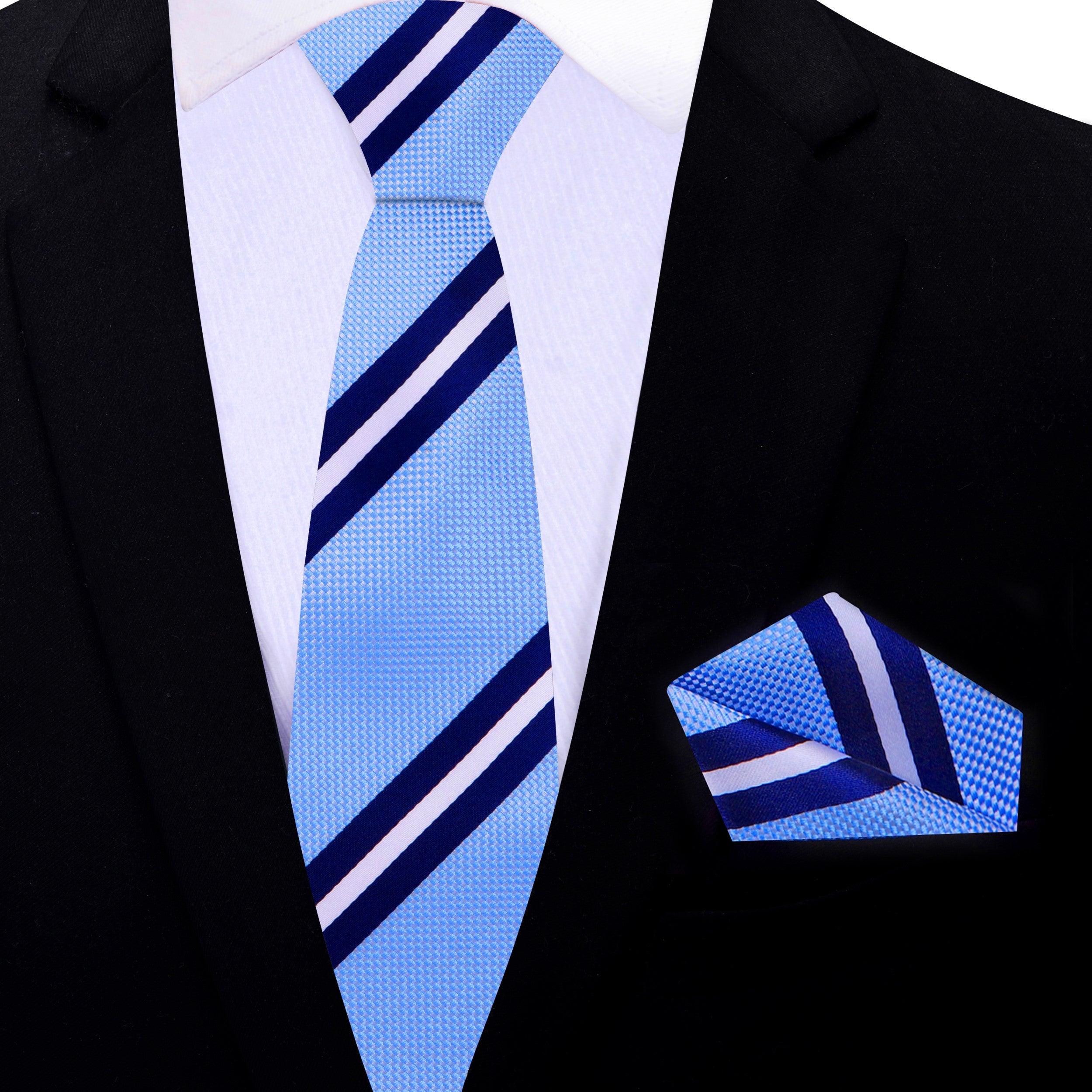 Close-up of the blue silk necktie showcasing the smooth texture and refined stripes.