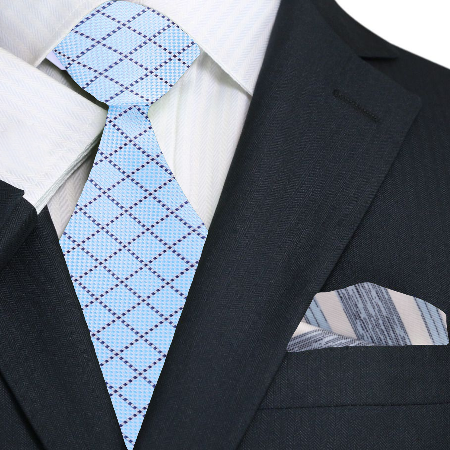 Mens wedding plaid necktie styled with a white shirt and navy suit