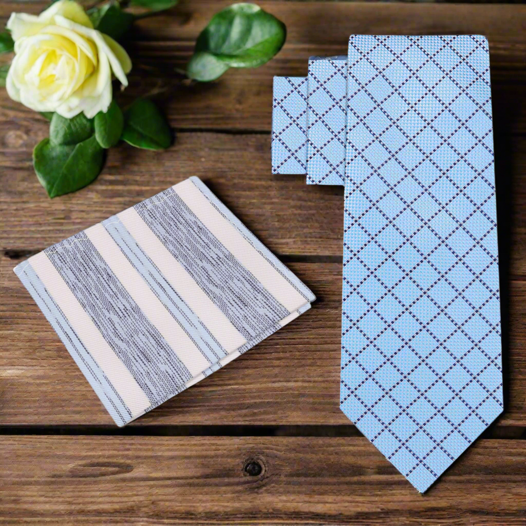 Mens wedding plaid necktie styled with a white shirt and navy suit