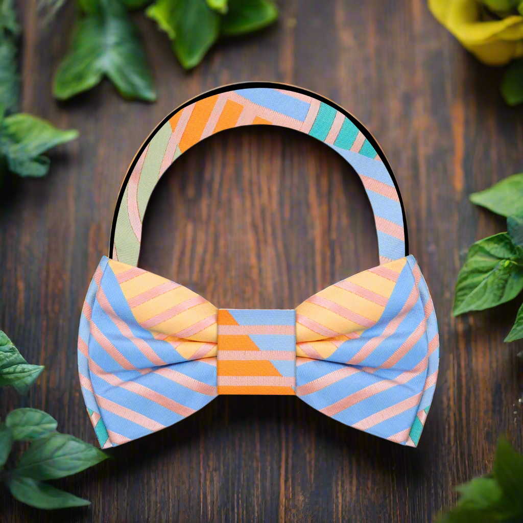 Vibrant multicolored plaid silk bow tie on a classic white shirt