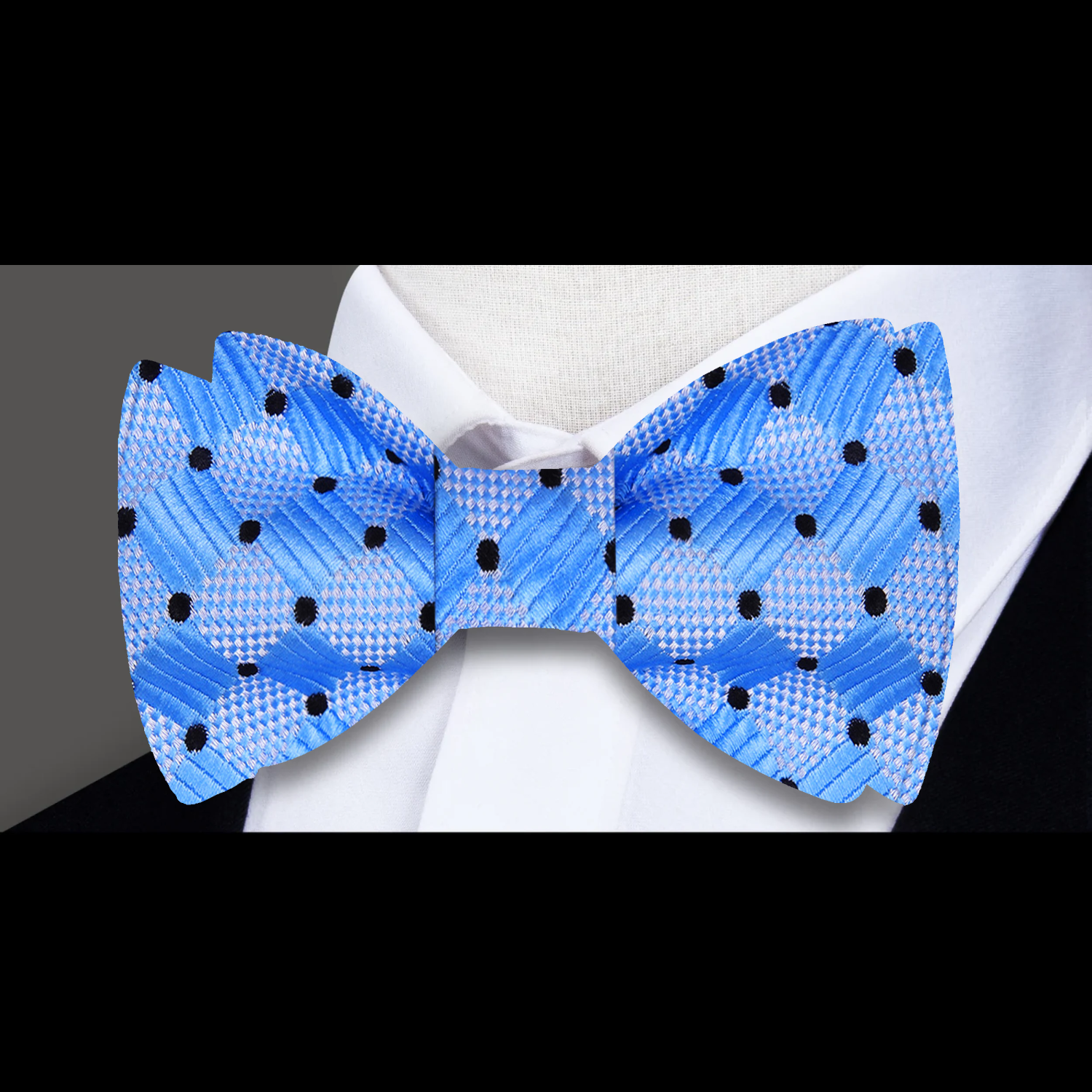 Child adjusting a pre-tied kids bow tie for a party