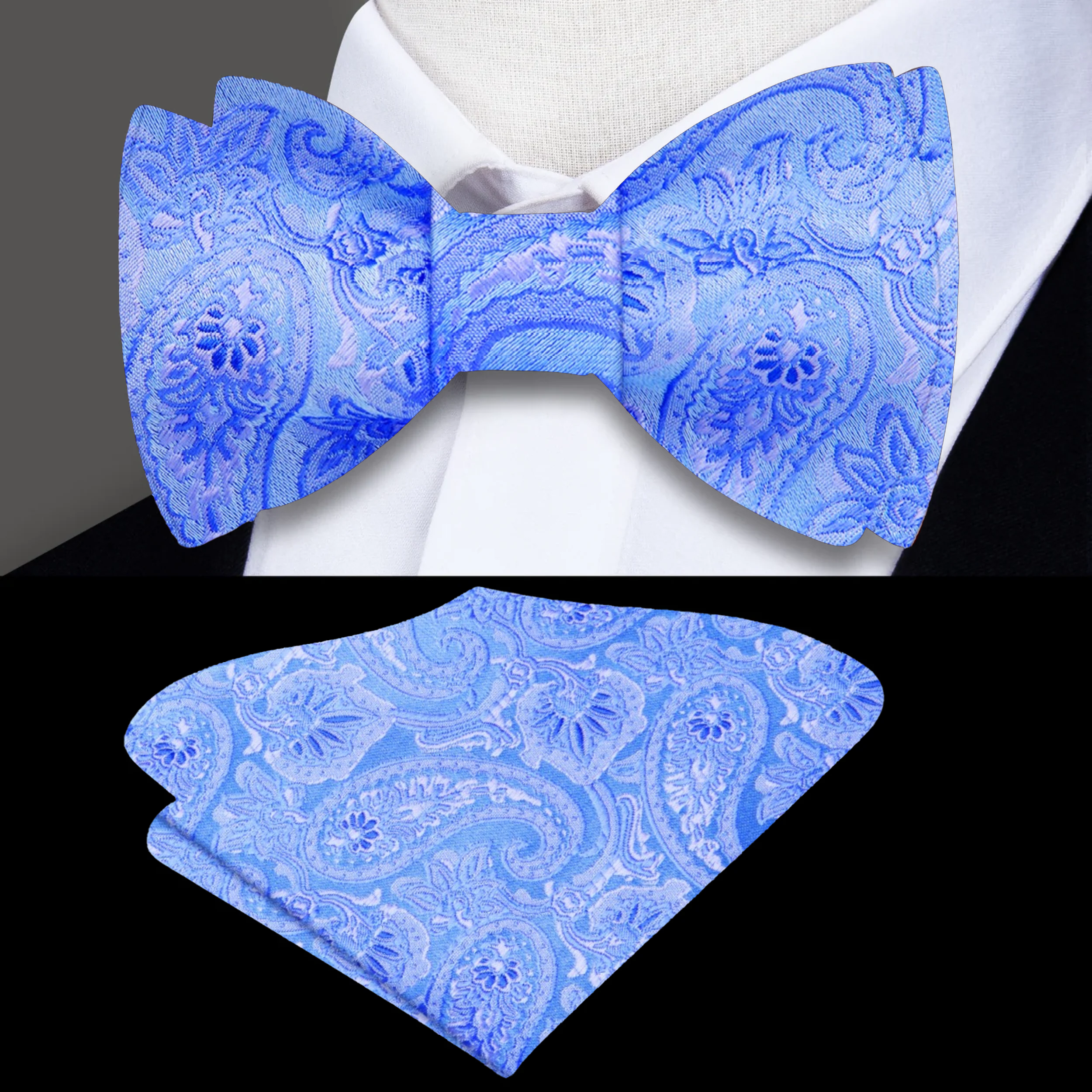 Model wearing a blue paisley silk bow tie paired with a navy suit