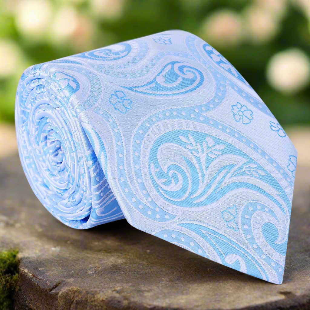 Front view of elegant light blue paisley necktie displayed on a white background.