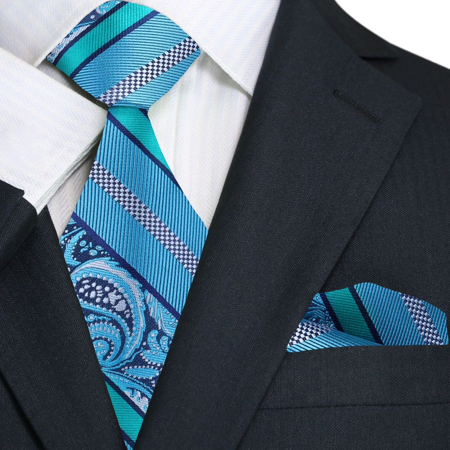 Man wearing the grey paisley necktie at a corporate meeting, paired with a white dress shirt.
