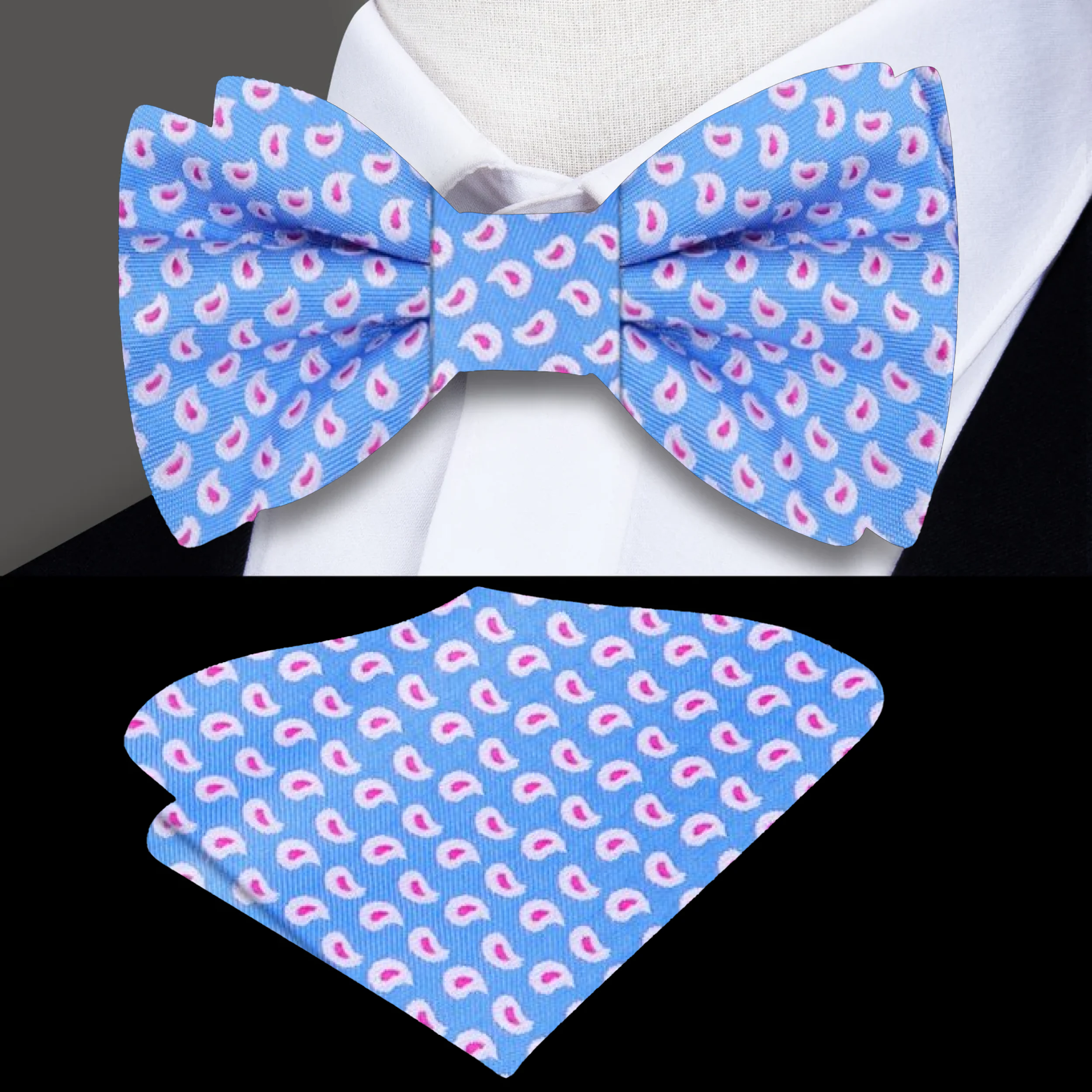Close-up of the light blue paisley silk bow tie, highlighting the delicate patterns and soft fabric.