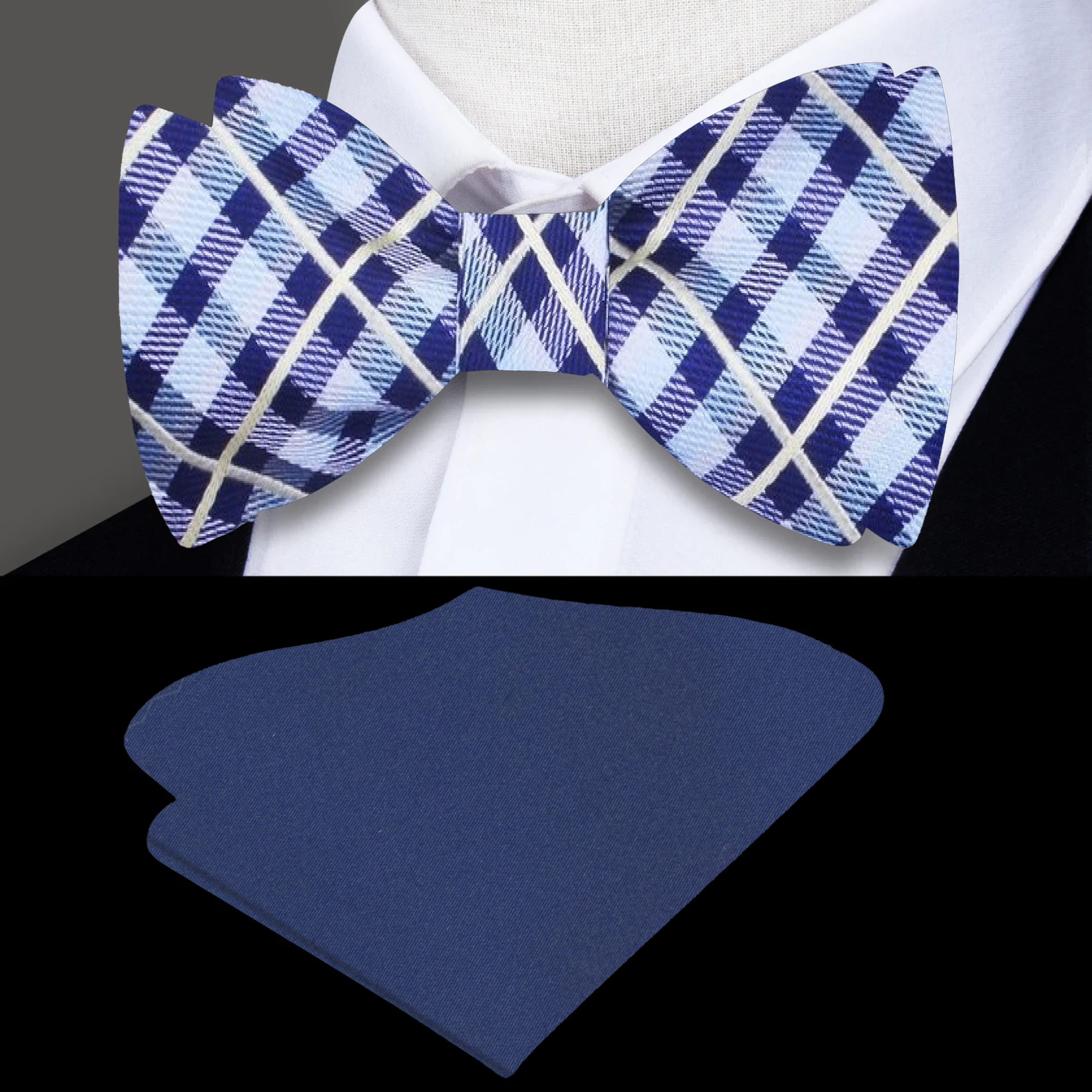 Close-up of the blue and yellow plaid silk bow tie tied neatly on a white dress shirt