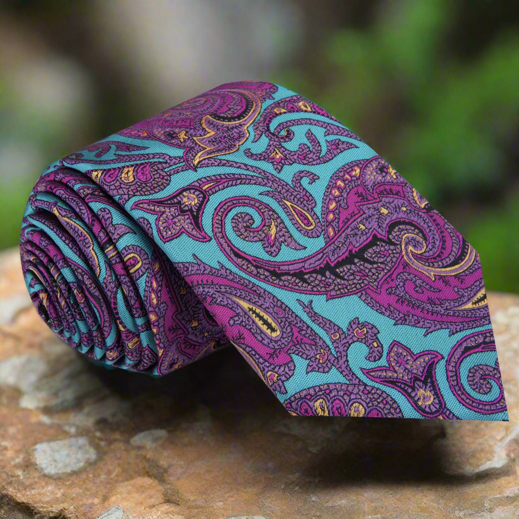 Close-up of vibrant paisley silk necktie in bright colors