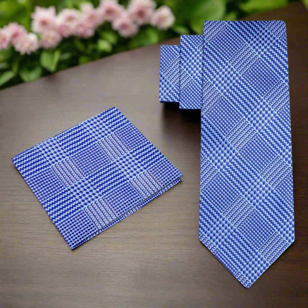 Men’s fashion featuring a light blue plaid dress tie for formal events