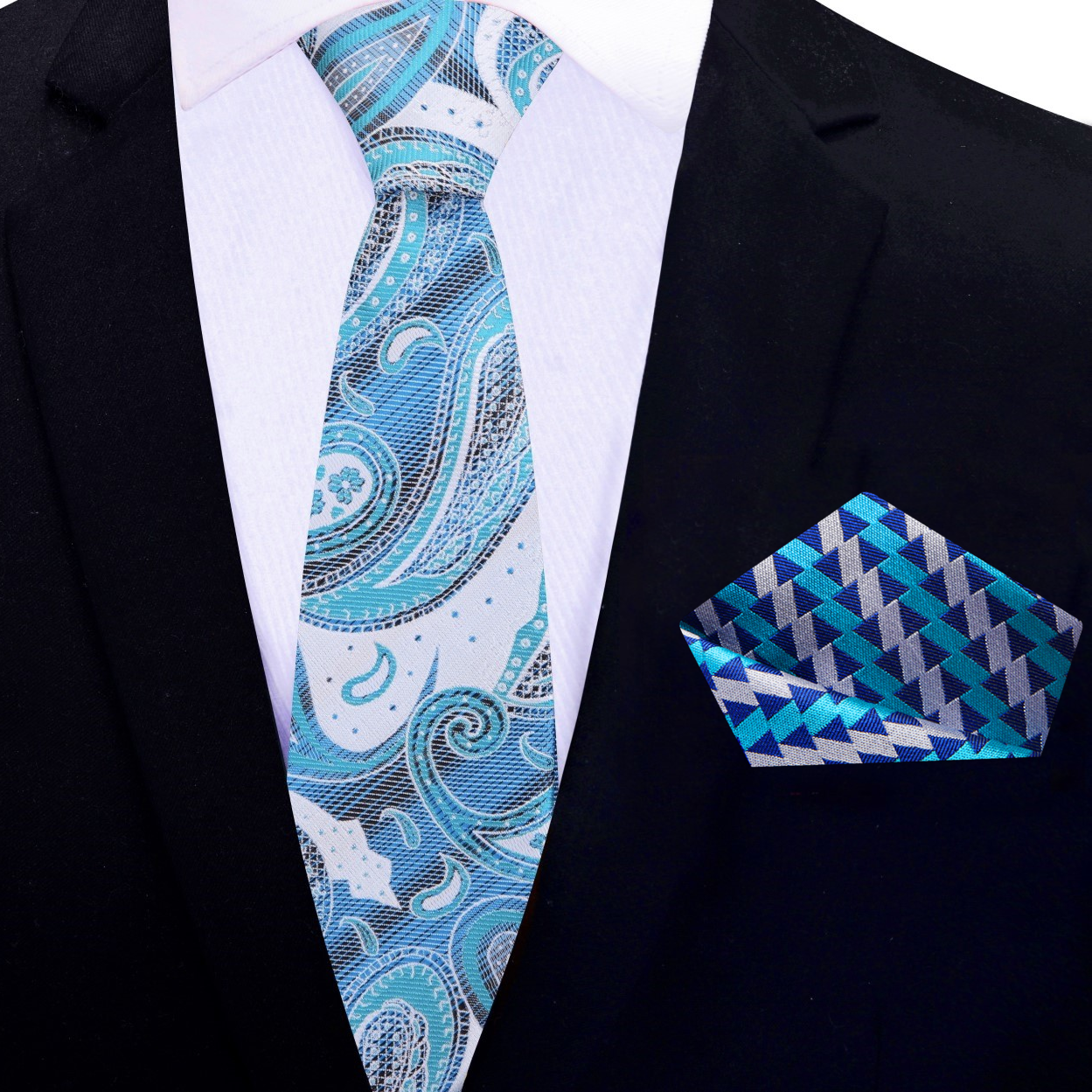 Silk necktie styled with a white dress shirt and gray suit for a wedding