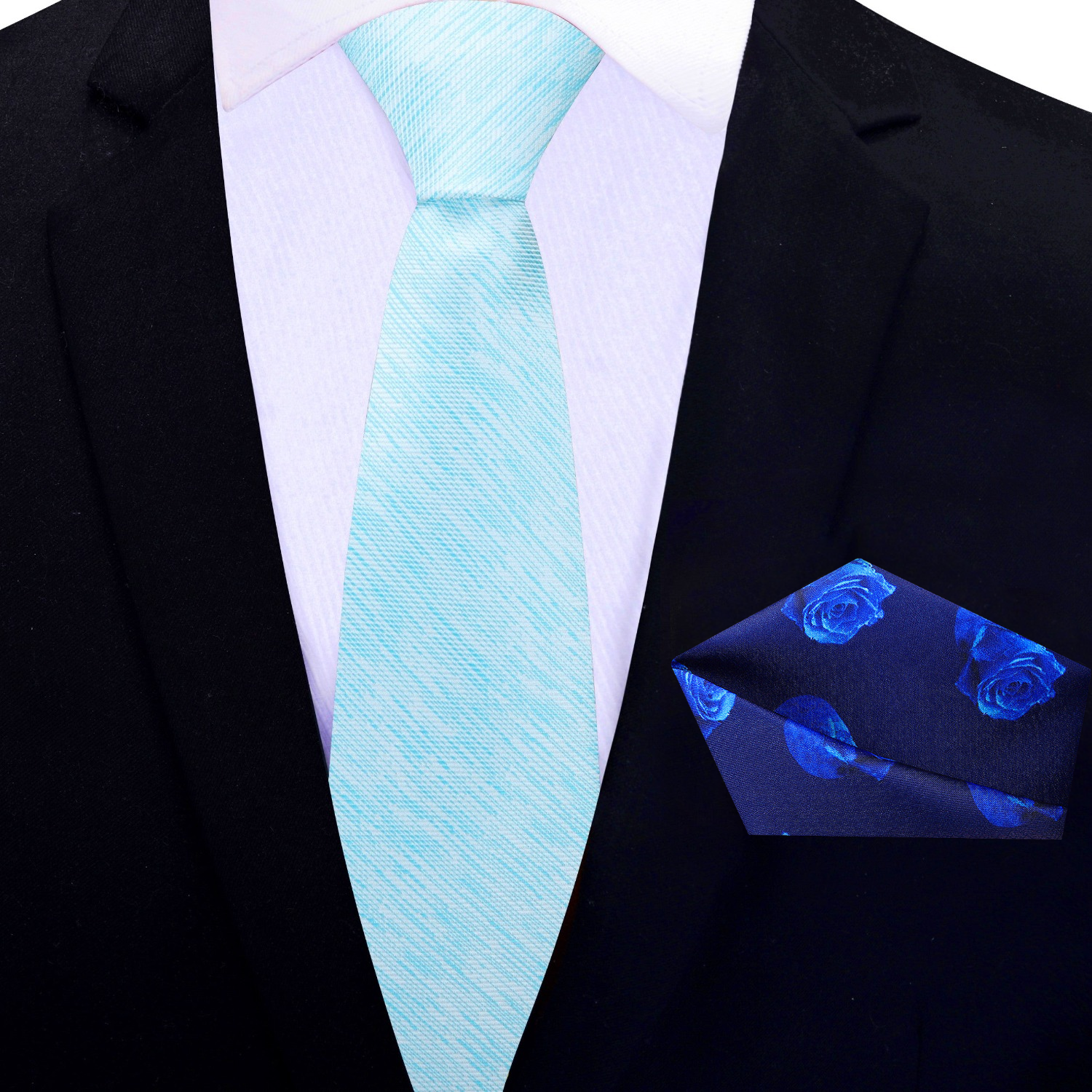 Elegant wedding outfit featuring a blue tie and matching pocket square