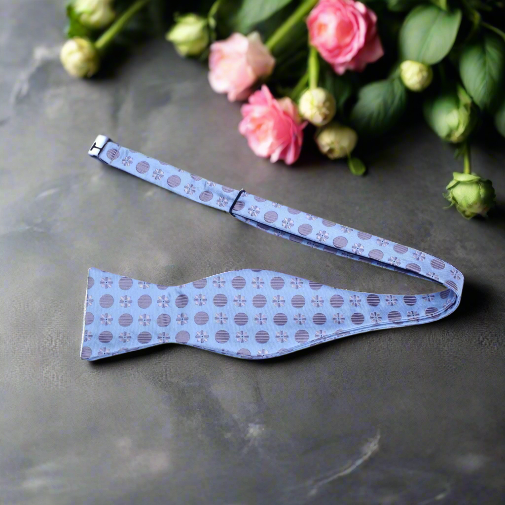 Close-up of the silk fabric and polka dot design on the bow tie