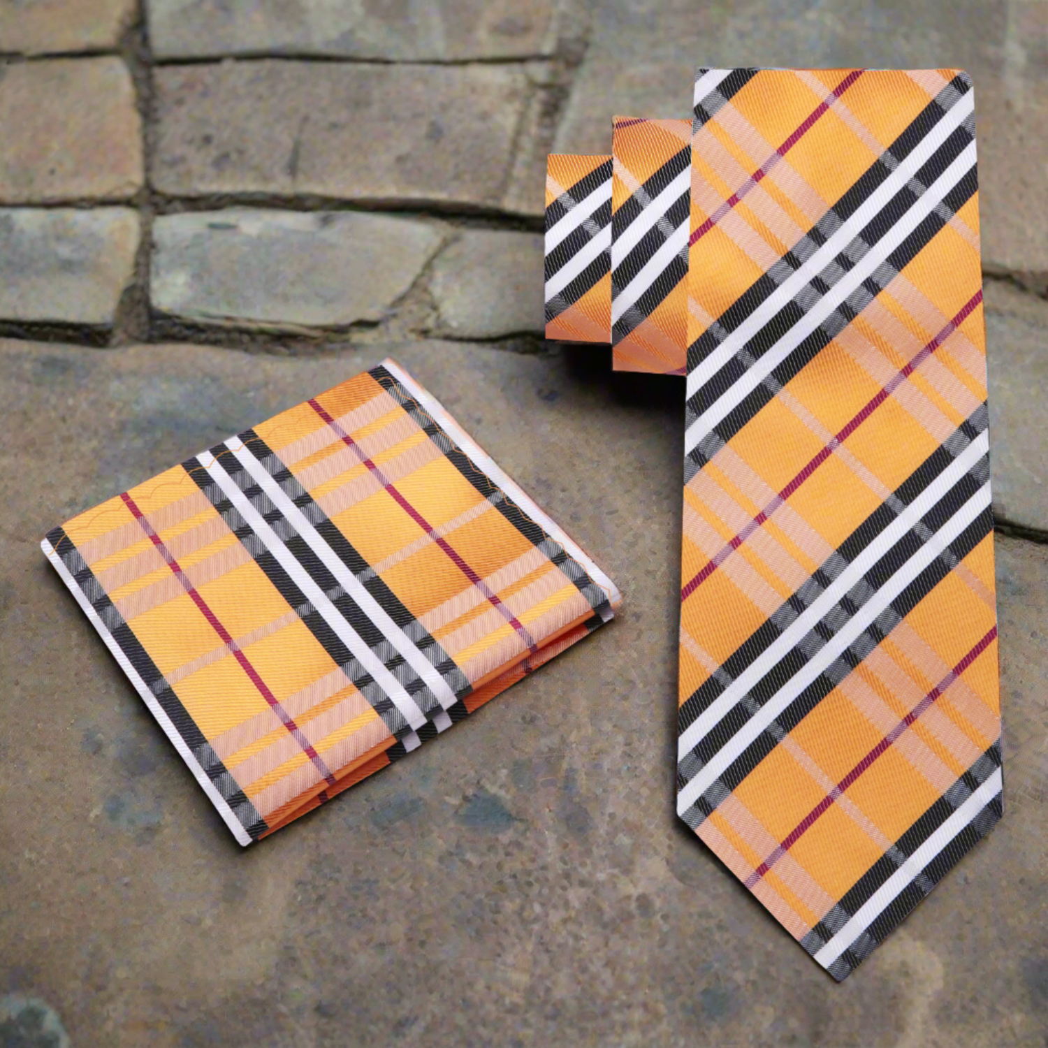 Close-up of the plaid silk necktie showcasing intricate pattern and rich colors