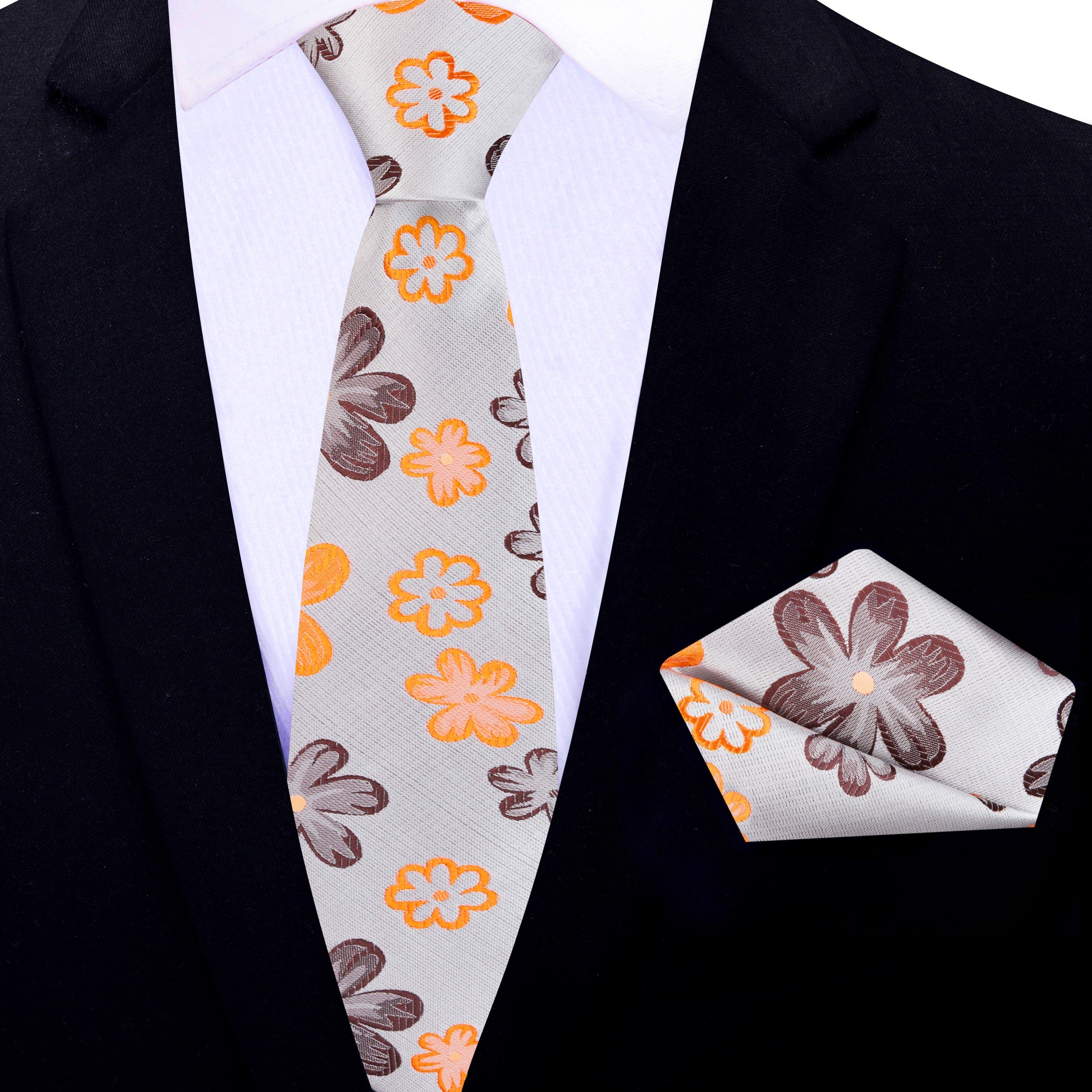 Close-up of the silk fabric and detailed flower design on the necktie