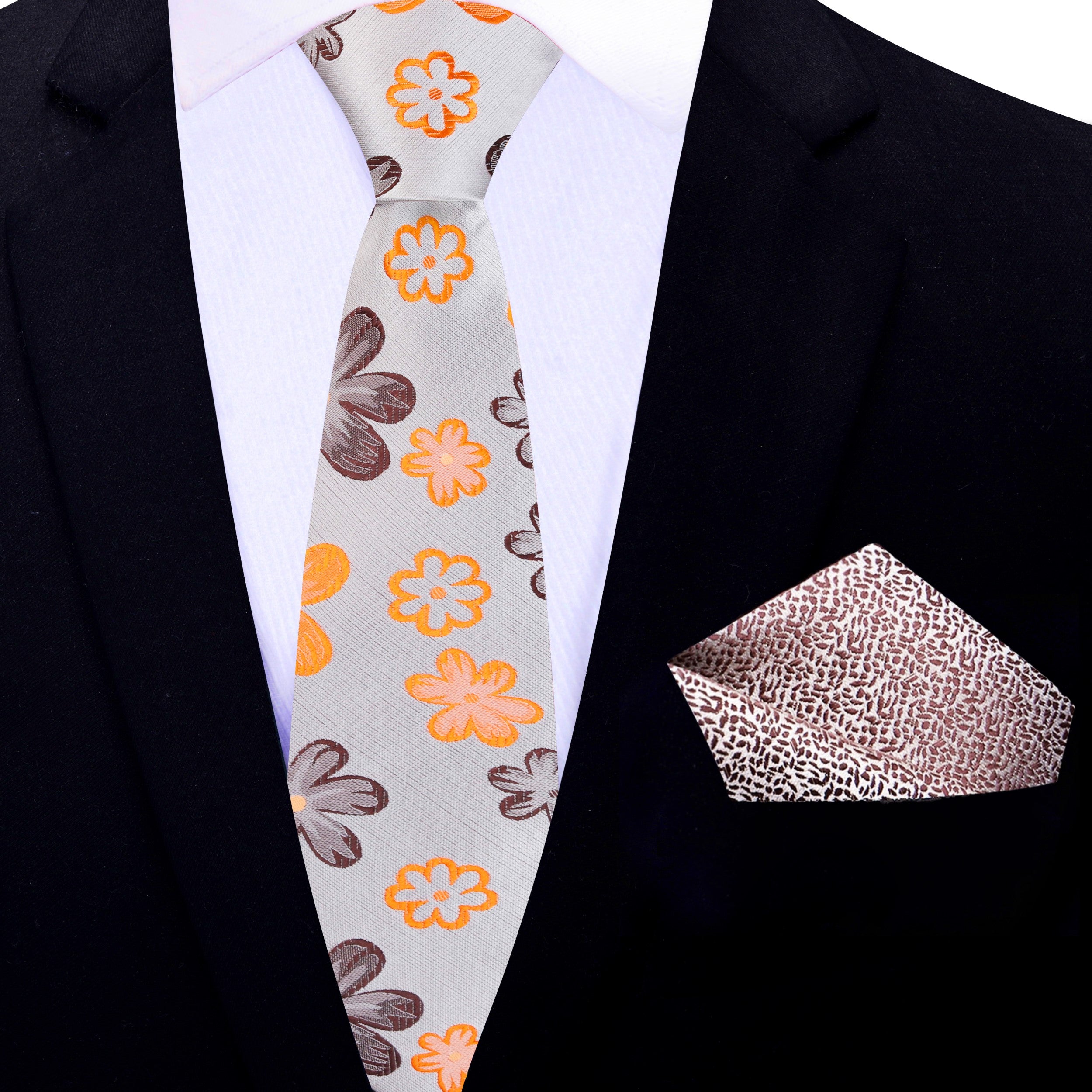 Close-up of the silk fabric and detailed flower design on the necktie