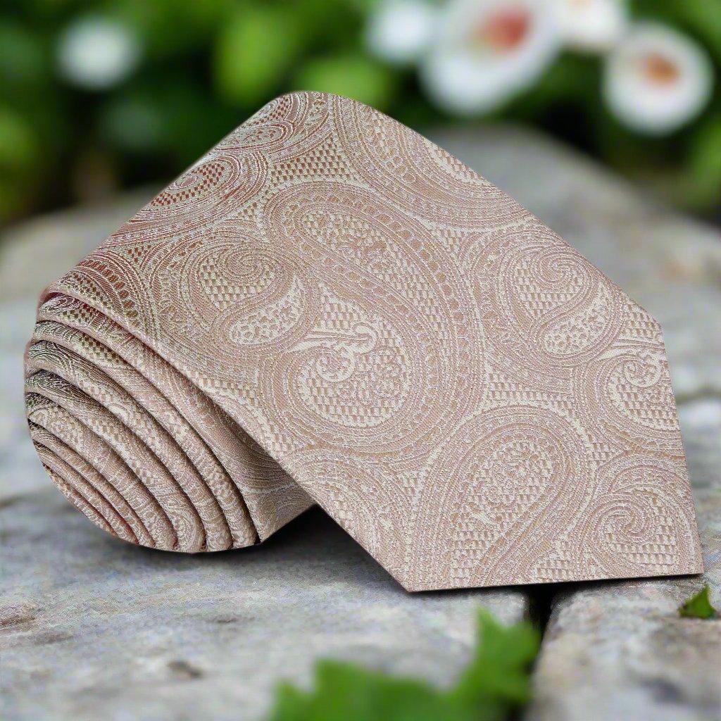 Elegant light brown paisley silk necktie styled with a white dress shirt