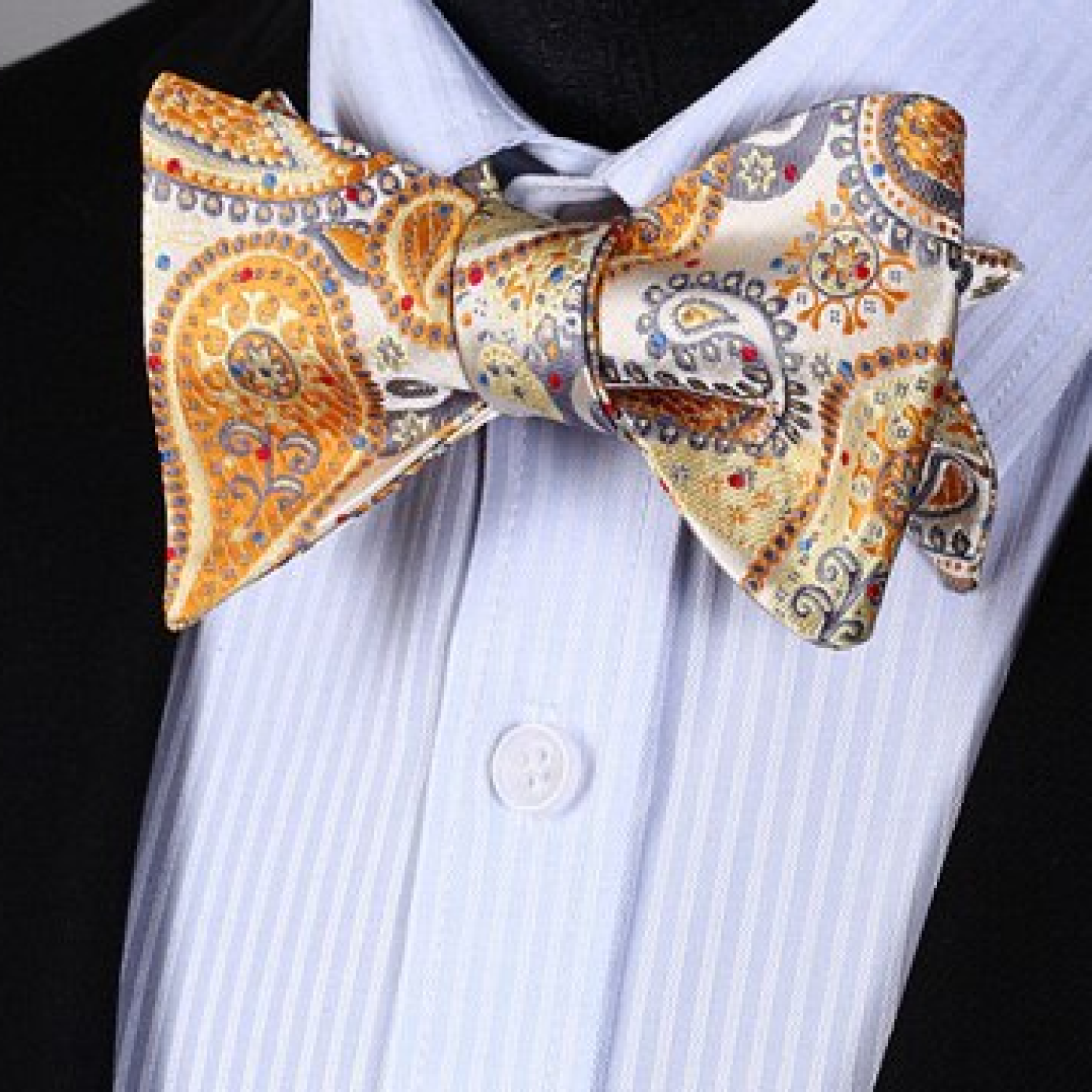 Close-up of the intricate paisley pattern on the bow tie