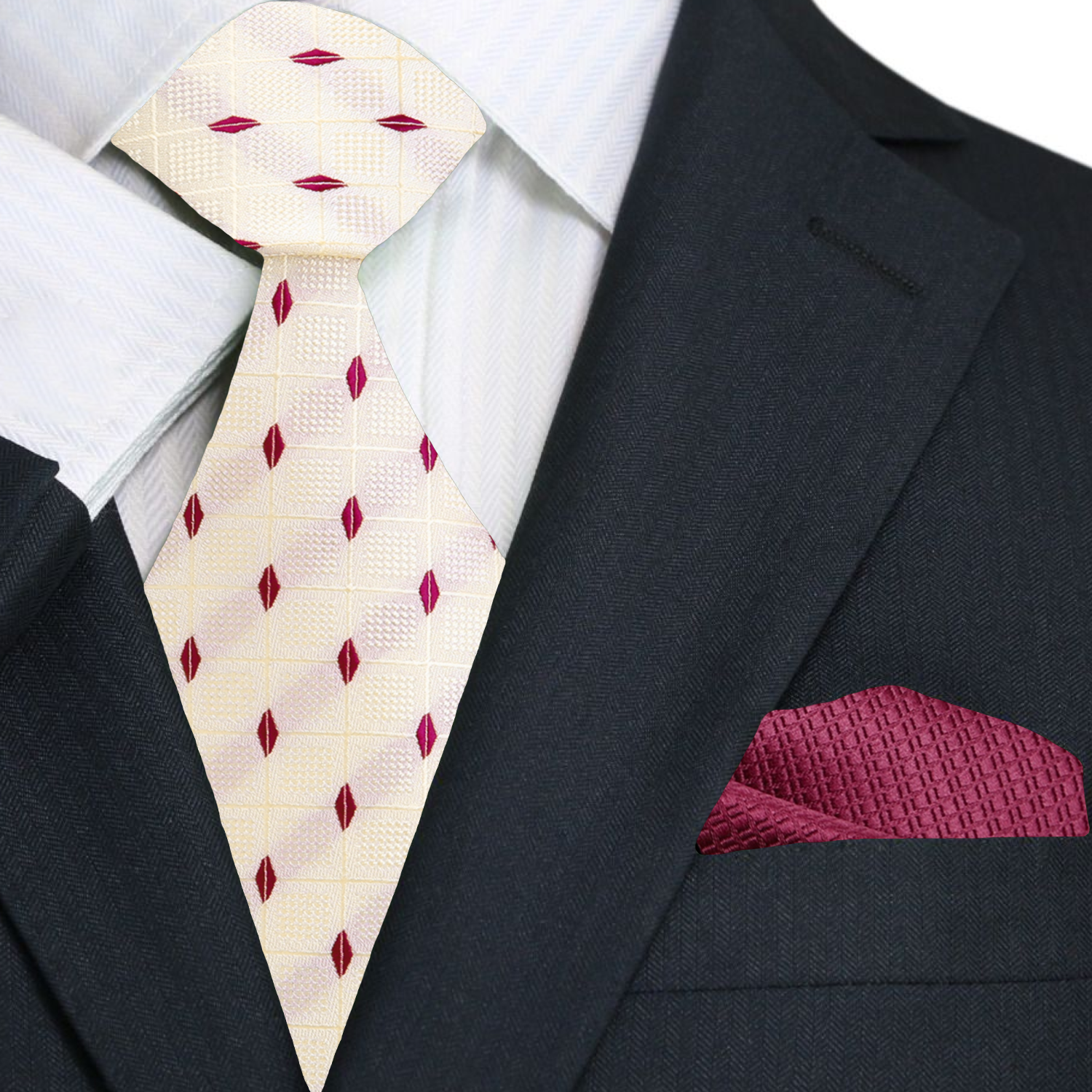 Close-up of the geometric diamond pattern on the rose gold and deep red silk necktie