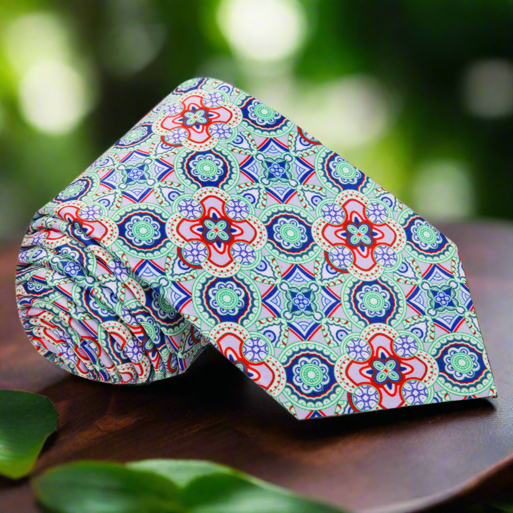 Close-up view of vibrant mosaic necktie showcasing intricate geometric patterns.