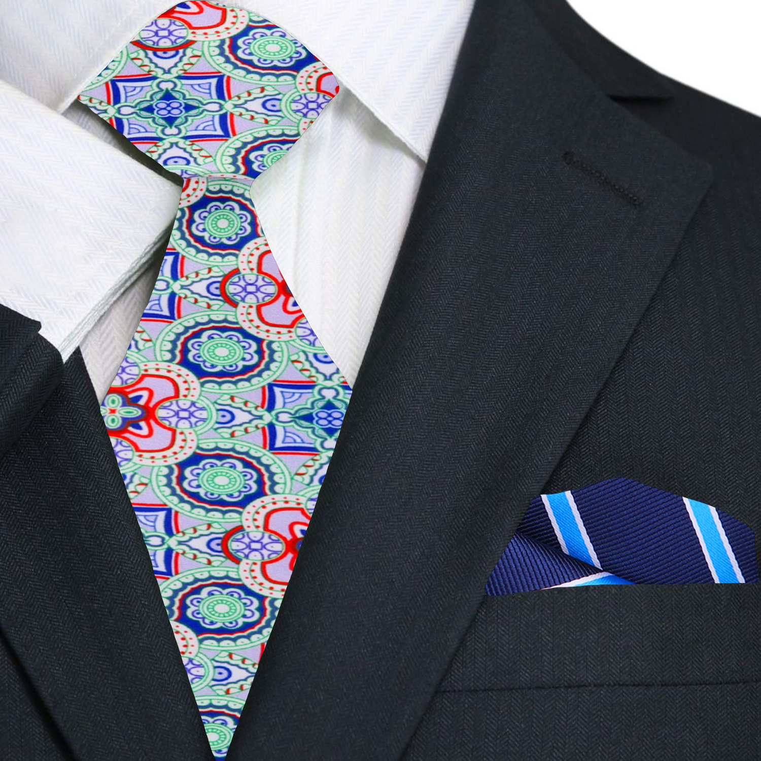 Model wearing a colorful mosaic necktie with a navy blue suit at an outdoor wedding.